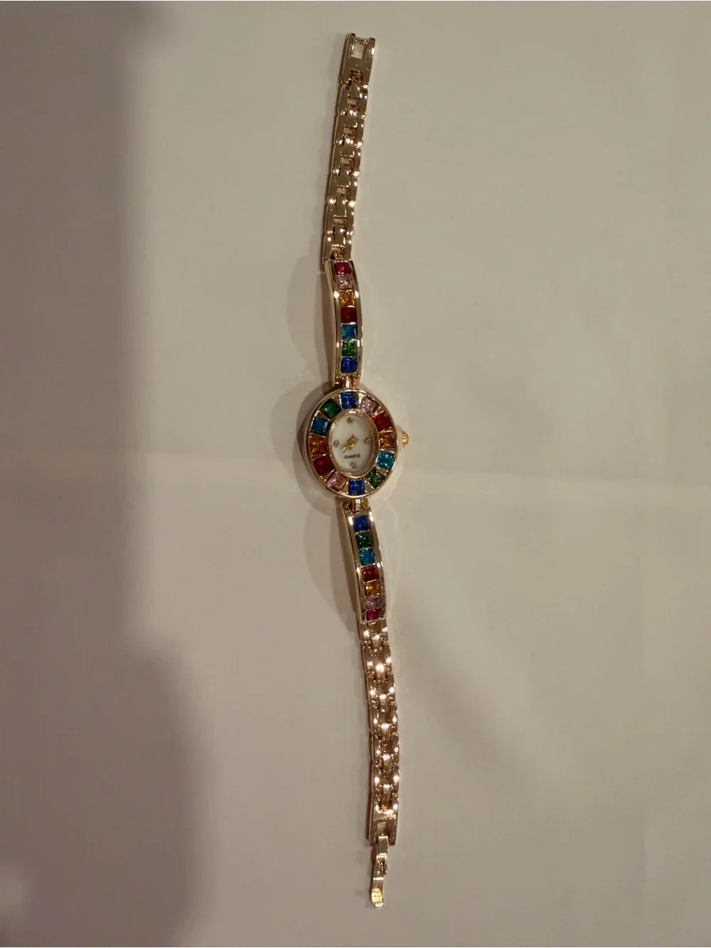 Gold-Tone Bracelet Watch with Multicolor Gemstones
